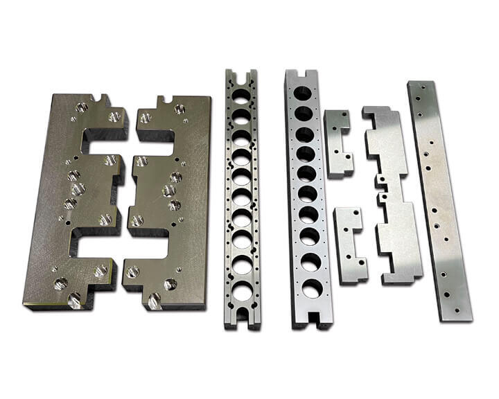 Vacuum connector blocks, bottom cover center blocks, side stop blocks, side pressure strips, etc., used in conjunction with vacuum equipment or cavity assemblies.